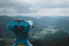 binoculars and mountain valleys