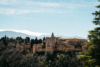 Alhambra Granada in front of the Sierra Nevada mountains in Andalusia