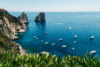 crystal blue water and boats in Capri, Italy