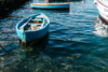 a blue boat on a line in Capri